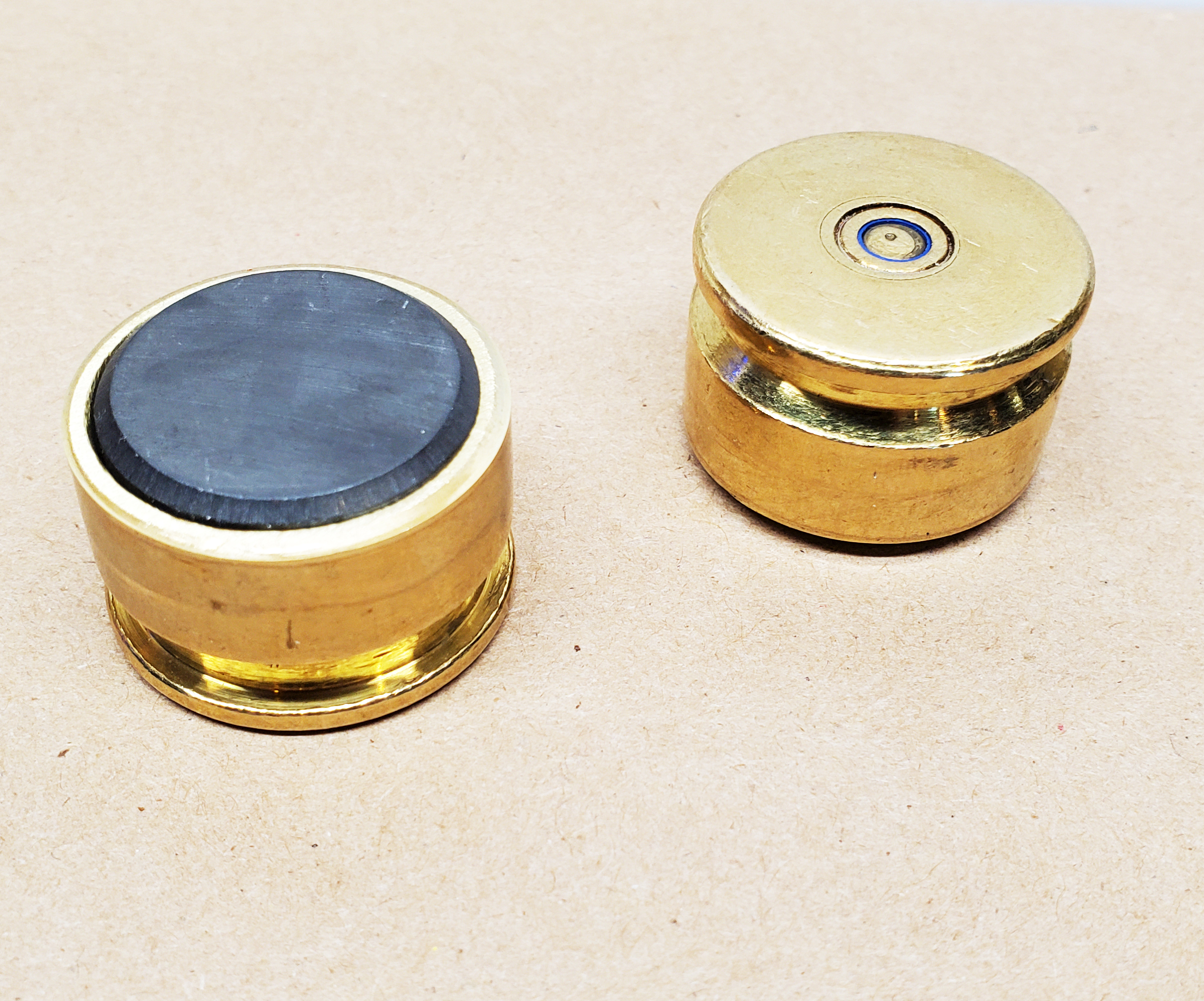 Pair of bullet brass magnets made with recycled casing of 20mm vulcan cannon round casing