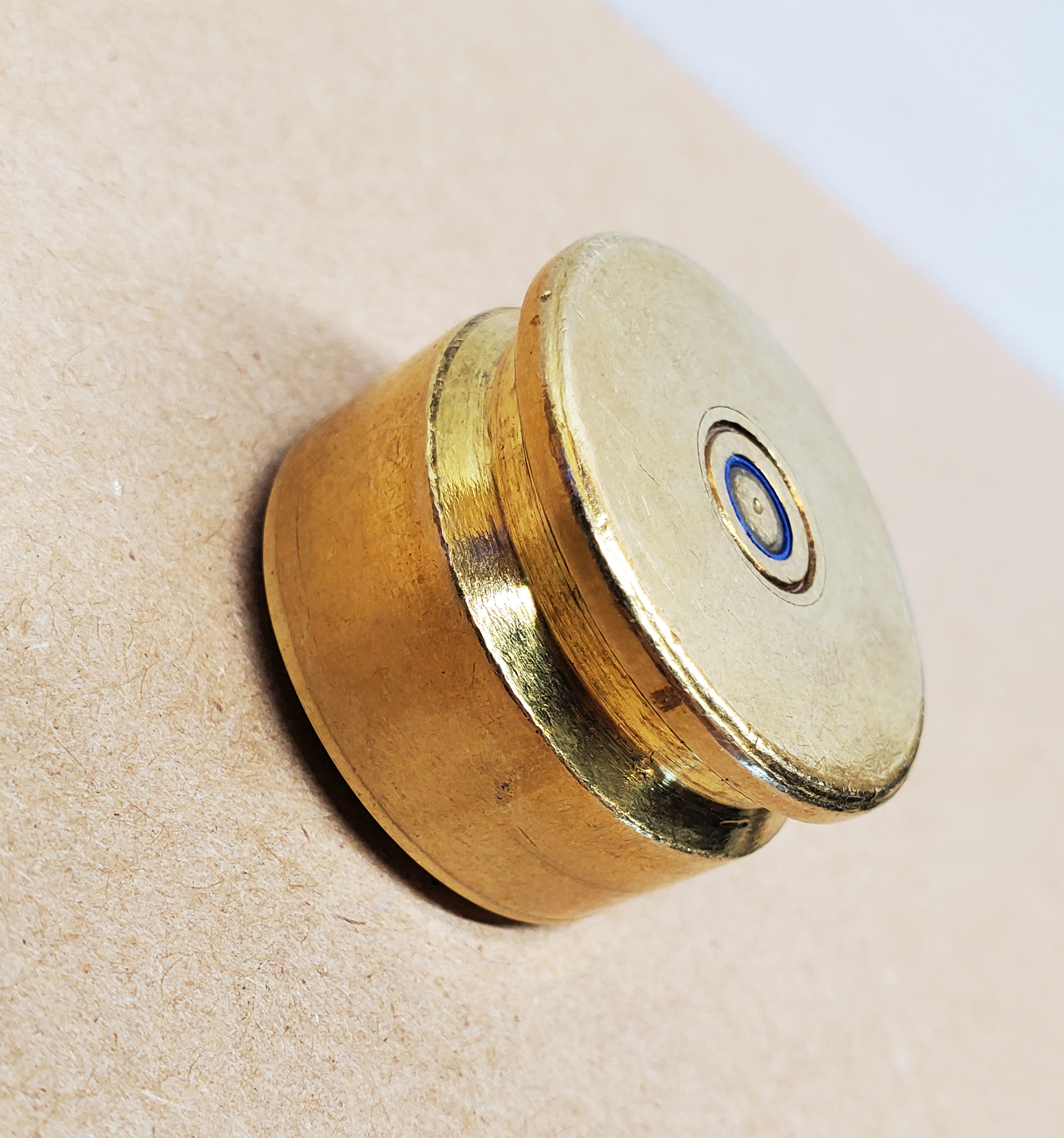 bullet brass magnet made with recycled casing of 20mm Vulcan cannon round side view